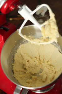 creamed butter and sugar in kitchenaid stand mixer with paddle flat beater attachment