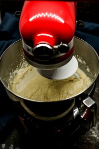 soft pretzel bite dough ball being formed in Kitchen Aid Stand Mixer with dough hook attached