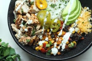 Close up shot of assembled southwest chicken bowls.