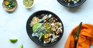 Southwest Chicken Bowls assembled in a black bowl.