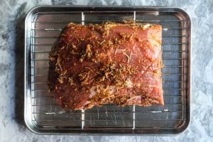 Roast rubbed with marinade on a stainless steel baking sheet lined with a wire rack.